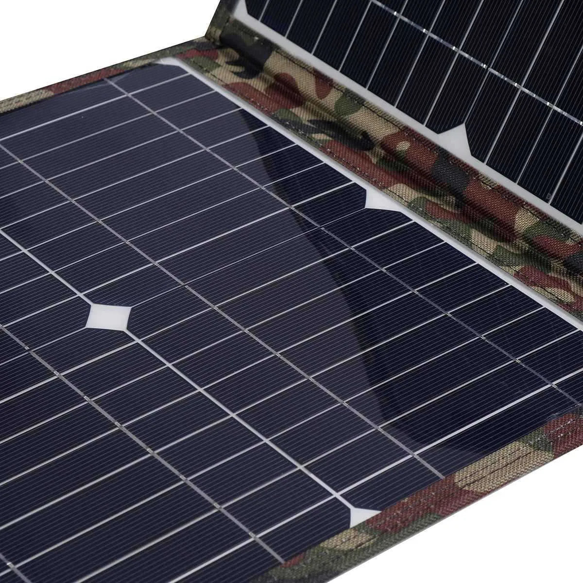 Black foldable solar panel unfolded showing three solar cells with accessories including battery clips and cables