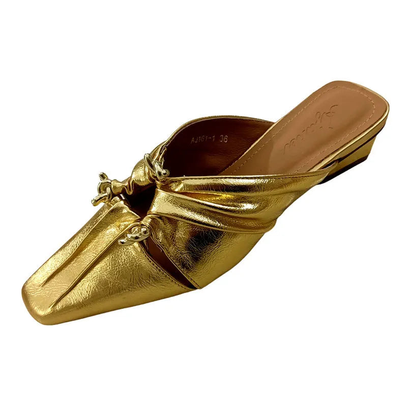 Women's genuine leather half toe cap slippers in gold colour with a low heel and square toe.