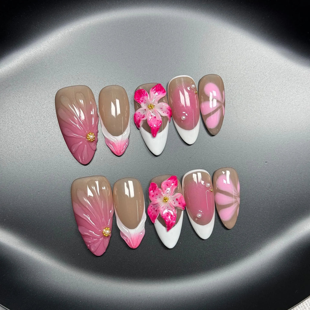 Set of plastic French style lily ice flower almond shaped nail armour capsules in XS, S, M, L sizes.
