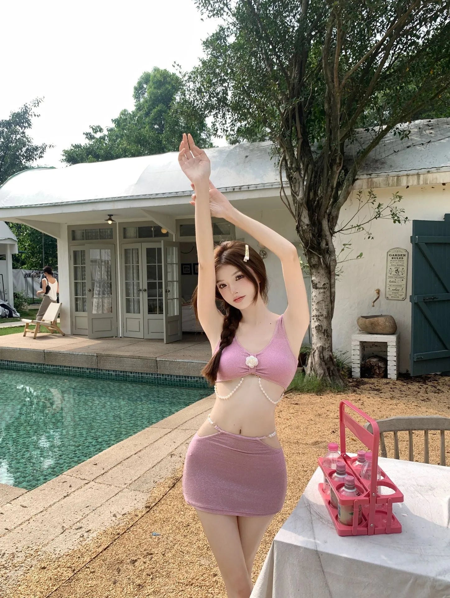 Women's pink or black polyester three-piece bikini swimsuit with briefs style for swimming and hot spring use