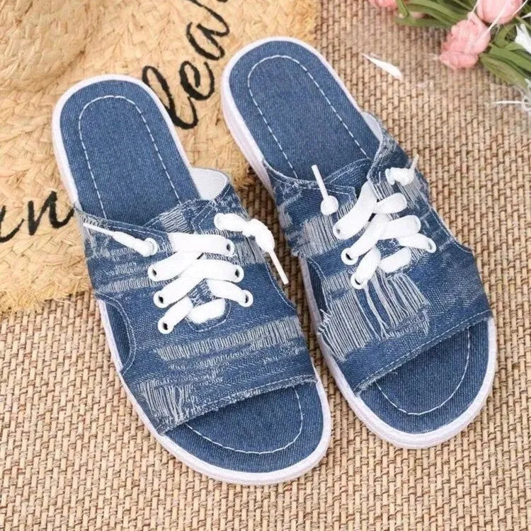 Blue Roman style women's canvas slippers with cloth upper and flat rubber sole