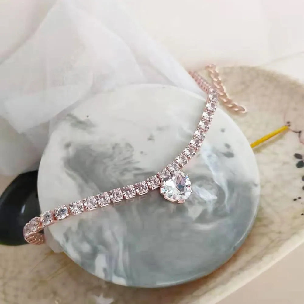 Gold rhinestone heart-shaped decorative collar for dogs and cats with extension chain.