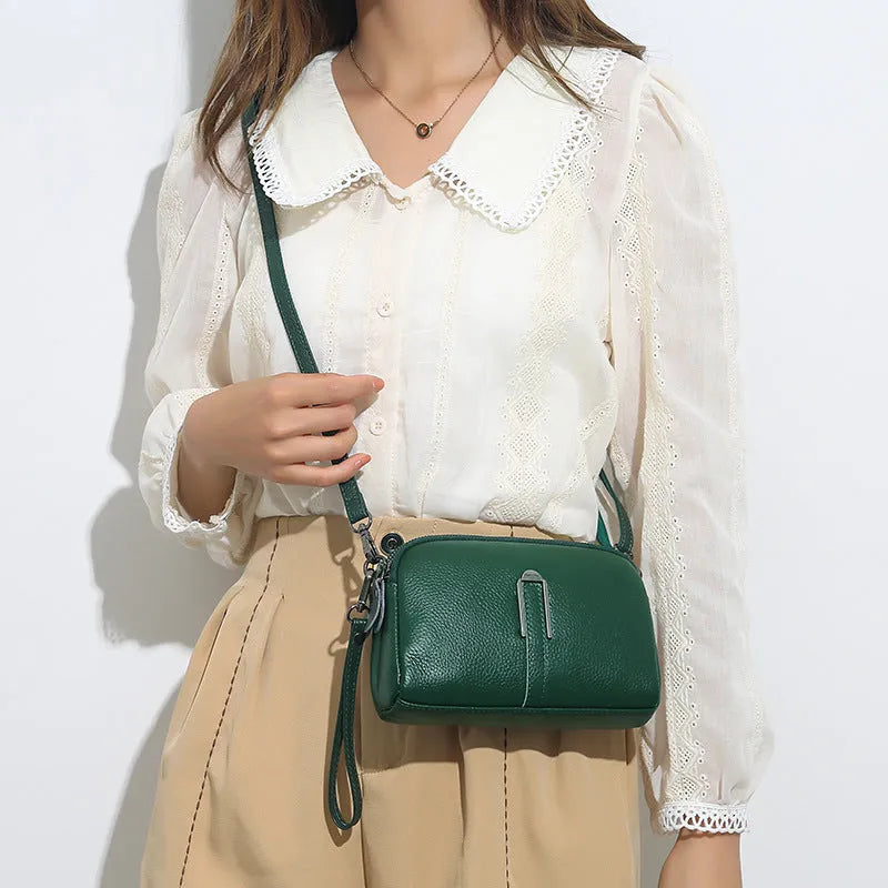 Genuine leather women's square shoulder bag in black, shown with dimensions 19cm by 13cm by 6cm.