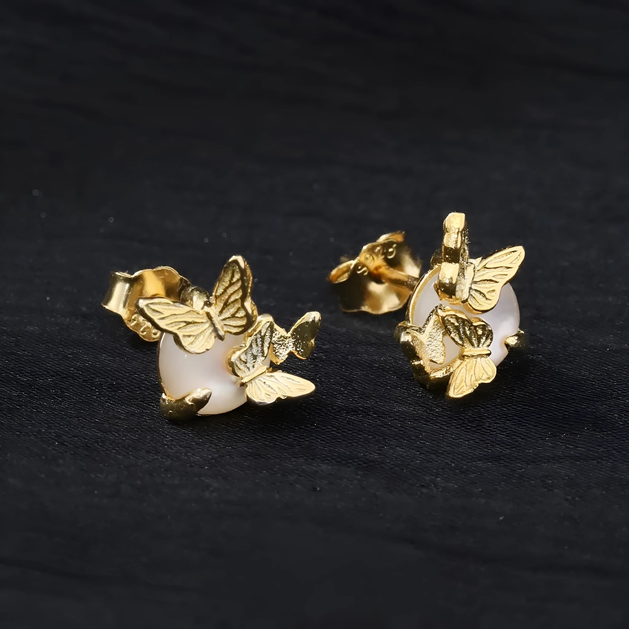 Butterfly ear studs in 925 silver with electroplated gold or white gold colour finishes