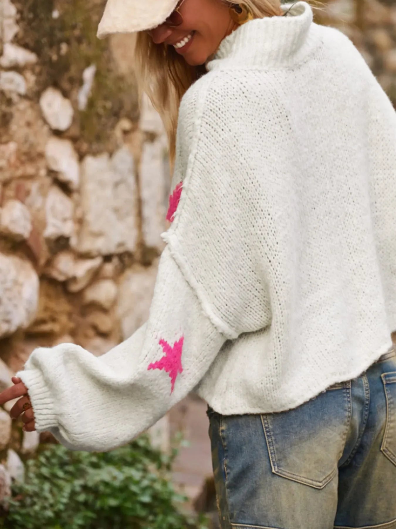 Women's white turtleneck pullover with five-pointed star pattern and loose fit design