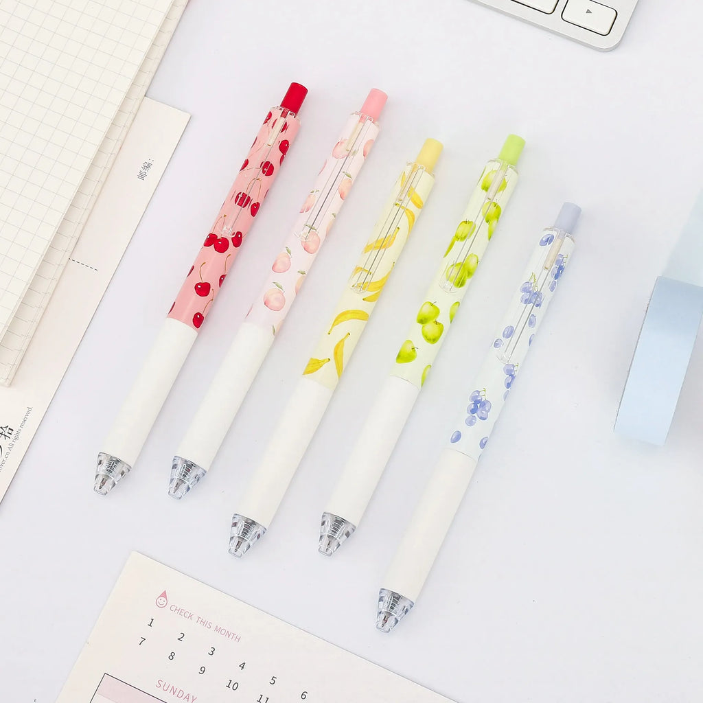Three fruit-scented press-action pens with 0.5mm quick-drying black ink refills on writing paper