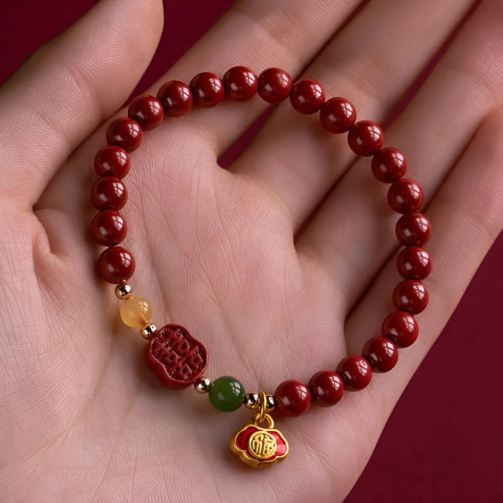 Emperor sandstone Happy Eyebrow Bracelet with cinnabar detail and fu character in New Chinese style.