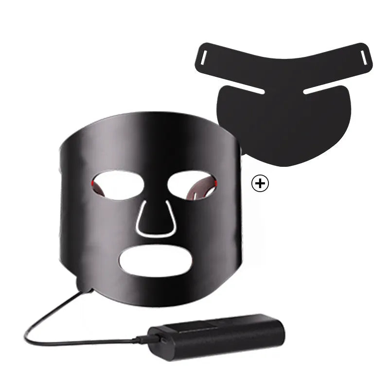 Black and white LED phototherapy face mask with controller for home skincare light therapy treatment