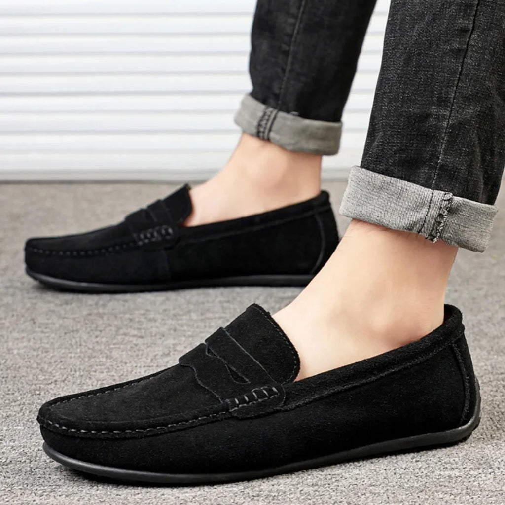 Men's brown suede slip-on loafers with round toe and flat rubber sole