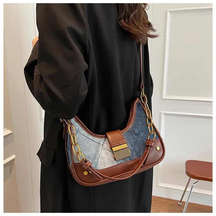 Brown denim women's bucket shoulder bag with diamond mesh chain straps and lock closure