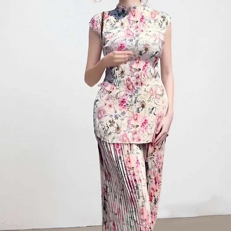 Long sleeve printed chiffon two-piece dress set with high-waist skirt on a model.