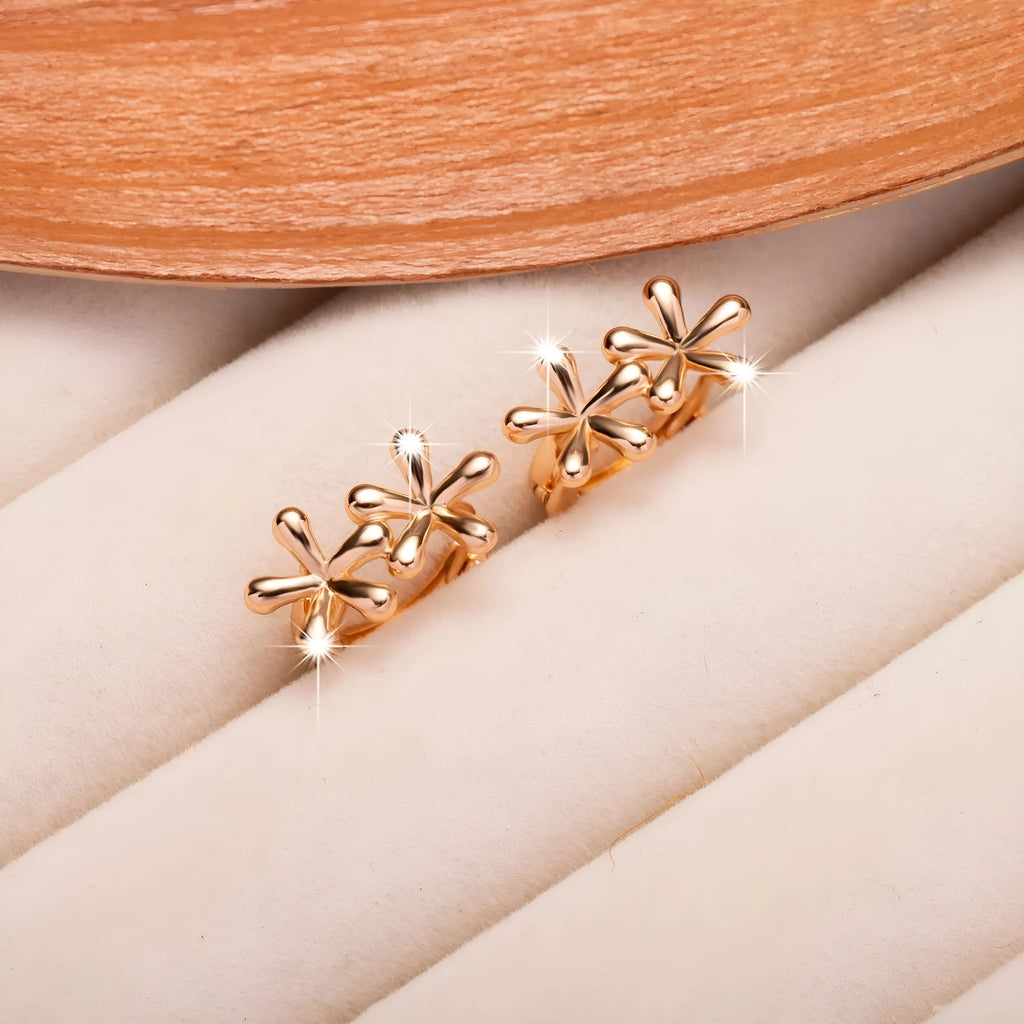 Rose gold circular earrings with waterdrop flower design and electroplated finish