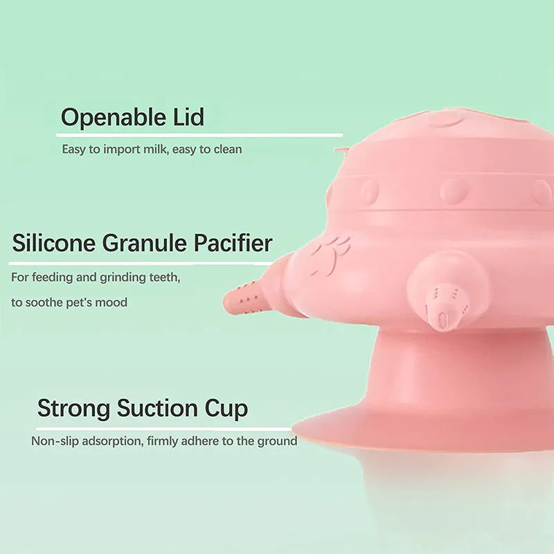 Pink silicone pet nursing device with four pacifiers for puppies and kittens