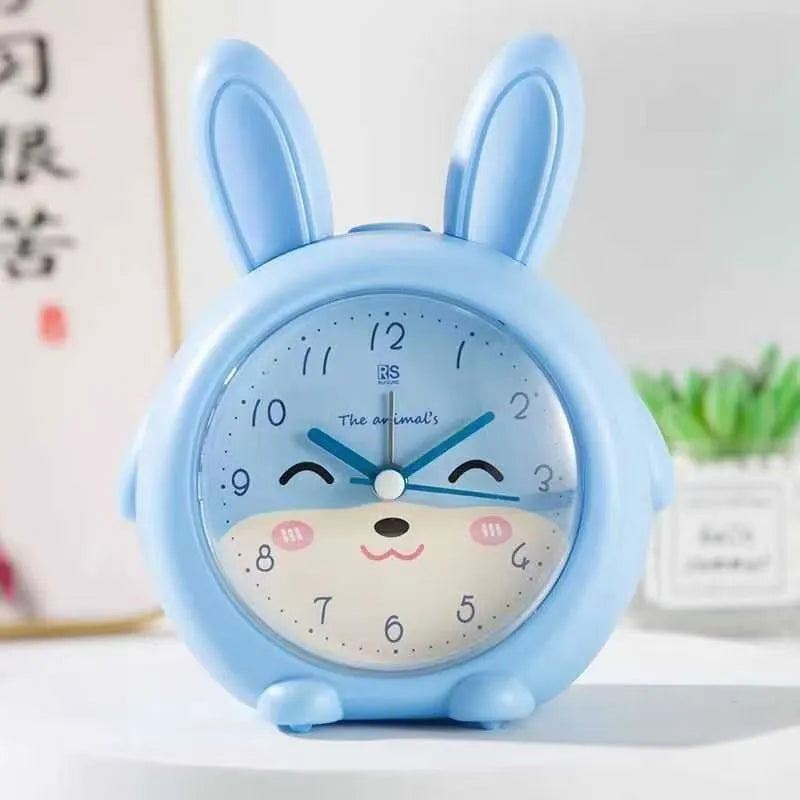 Children's cartoon alarm clock with singing alarm, night light, and mute function in pink or blue