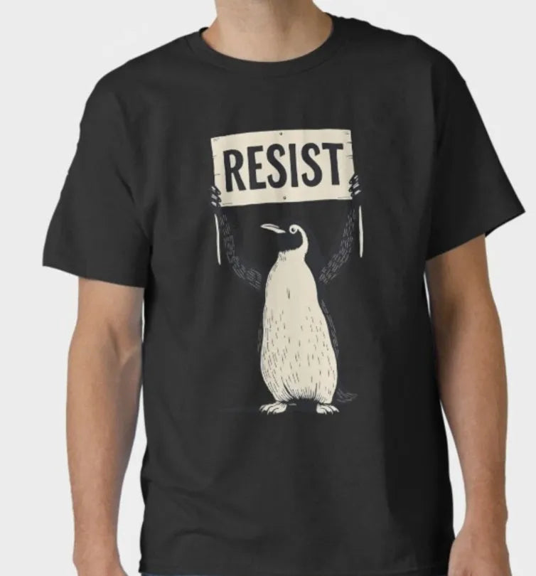 Loose fit short sleeve cotton T-shirt in black on a hanger.