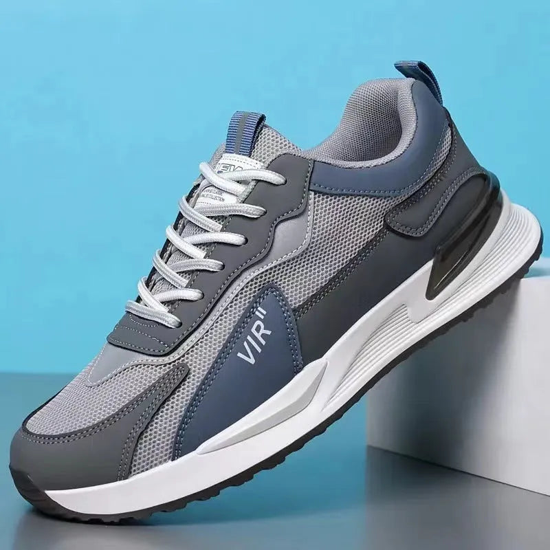 Men's colour block mesh sneakers in grey with lace-up front and low-top design.