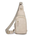 Women's soft PU messenger chest bag in beige with open pocket and stitching detail