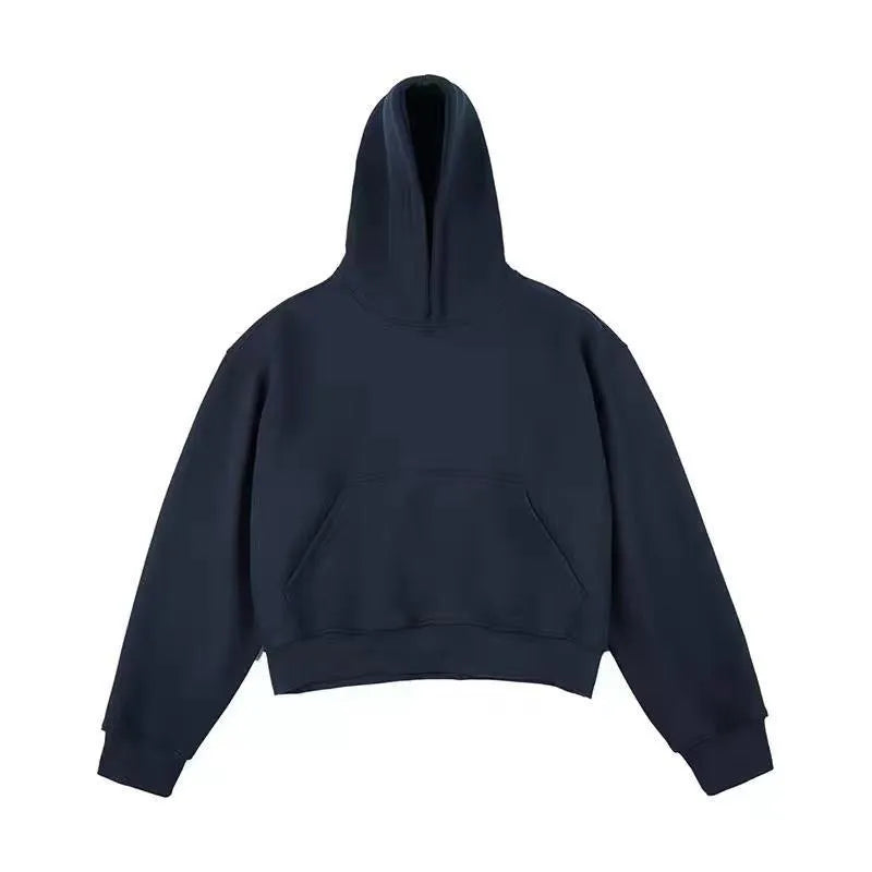 Man wearing a dark grey Chinese cotton composite hooded sweater with the hood removed.