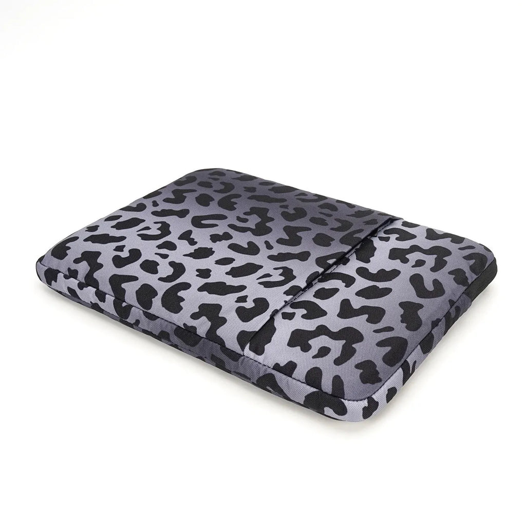 Leopard print laptop sleeve for 13-inch and 15.6-inch computers with waterproof anti-shock protection.