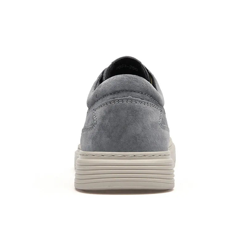 Men's grey casual pigskin skate shoes with rubber sole and round toe design