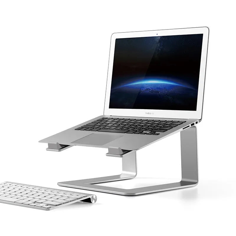 Black aluminium alloy laptop stand with ventilation slots on desktop
