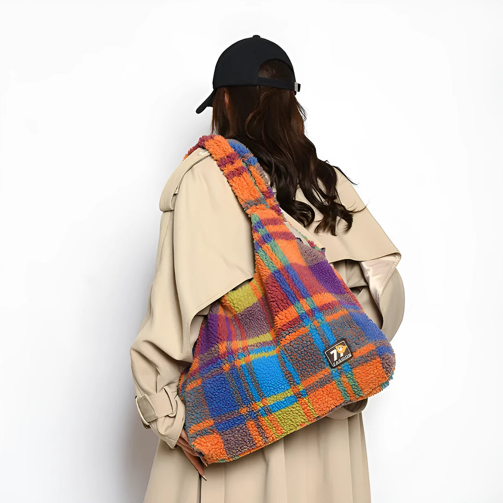 Women's plaid crossbody shoulder bag in soft plush material showing orange, purple and army green colour options