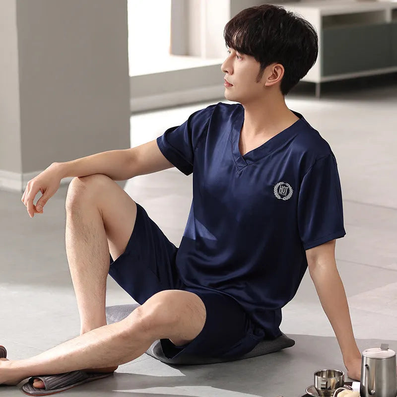 Men's ice silk pyjama set showing short-sleeved shirt and loose shorts in cooling fabric