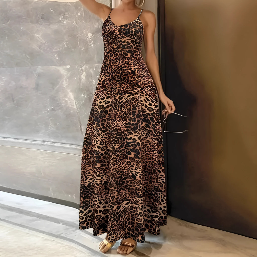 Dark brown leopard print women's long dress with sleeveless round neck and sling straps on a mannequin.