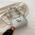PU dumpling underarm bag with one-shoulder strap, sandwich pocket, sewing thread detail, shown in black