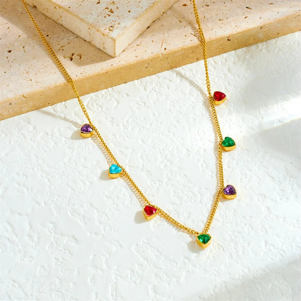Gold-coloured heart pendant necklace on a stainless steel chain for women.