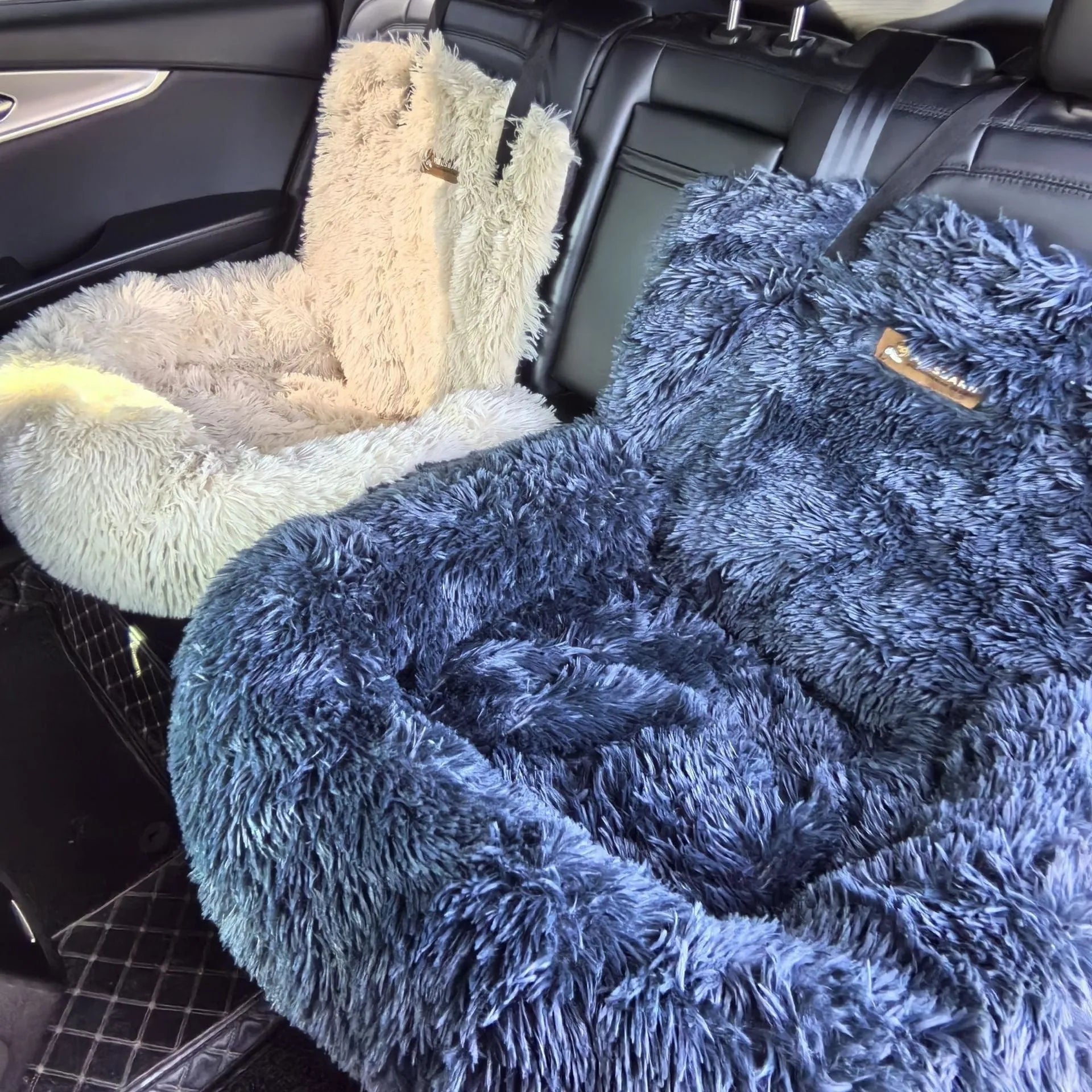 Dark grey thickened cloth pet mat placed on a car seat, showing size and texture.