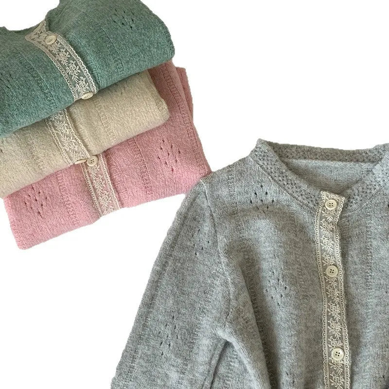 Loose artistic retro knitted cardigan coat in viscose fibre, shown in apricot colour.
