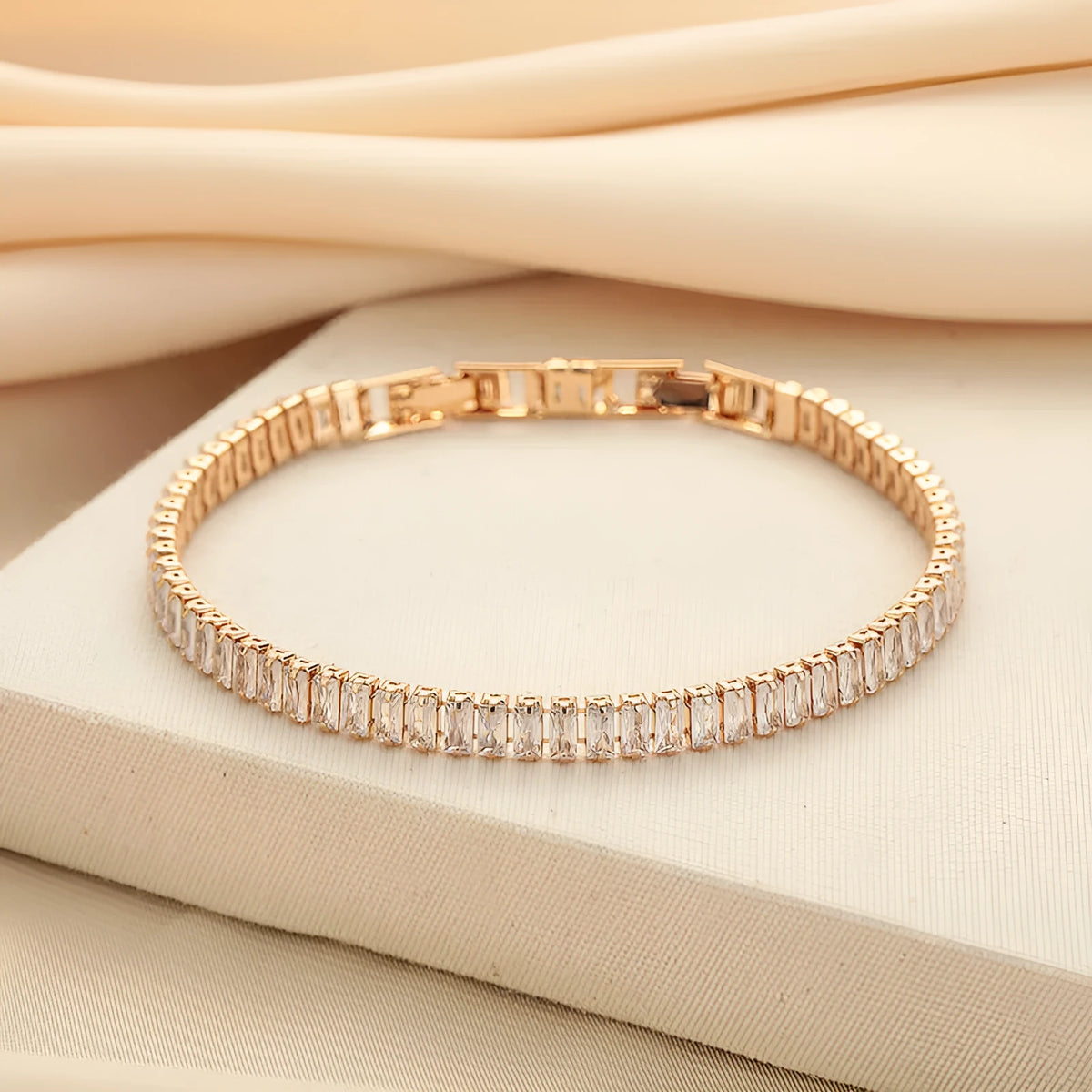 Geometric rectangular brass bracelet with zircon inlays in champagne gold or silver colour