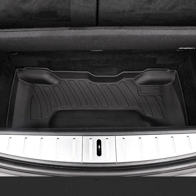 Tesla floor mats made from black rubber with textured TPE footrest section for Model 3, Y, S, and X vehicles
