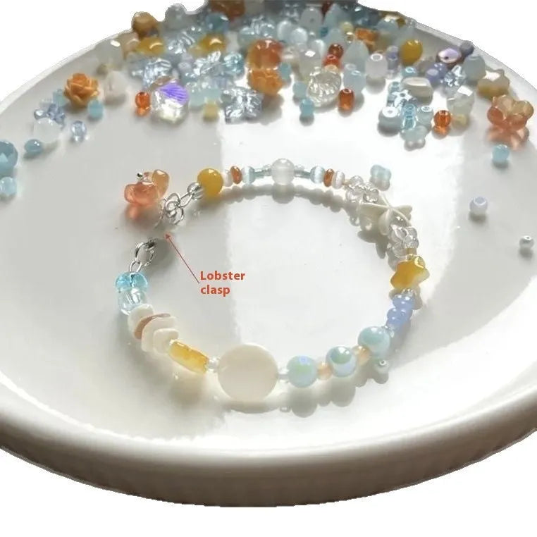 Orange sea coloured alloy bracelet with crystal beads and diamond pendant for women