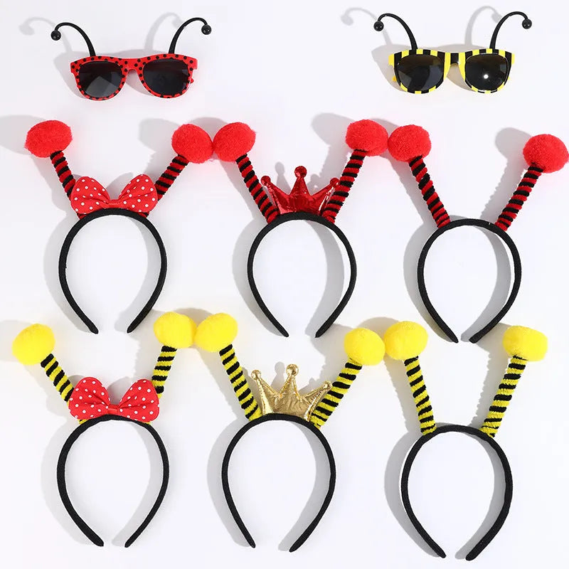 Yellow and red bee costume headband and matching black frame glasses for children's dress-up.