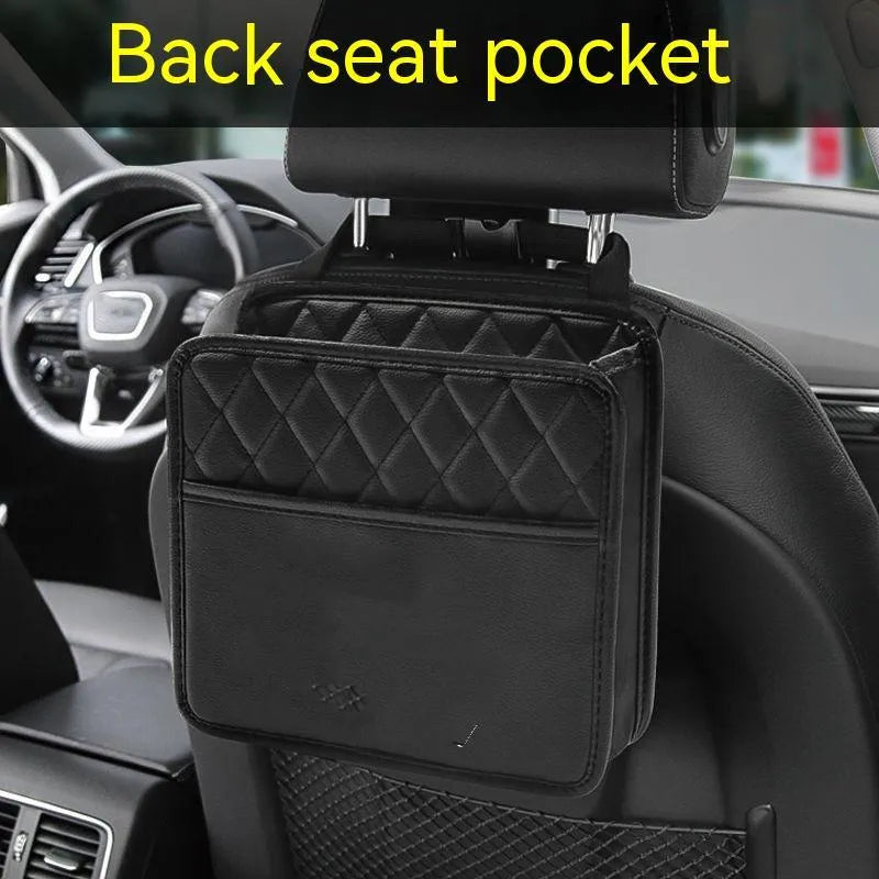 Leather hanging storage bag for car interior, shown in black, mounted on a car seat.