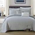 Pure cotton double-sided bed cover set in Damascus pattern with quilted detail on a bed