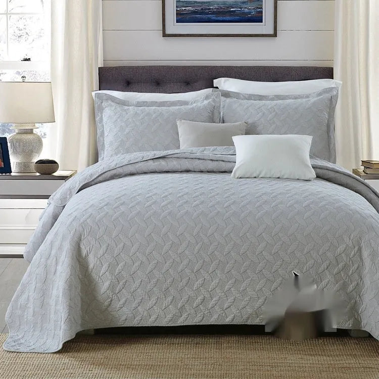 Pure cotton double-sided bed cover set in Damascus pattern with quilted detail on a bed