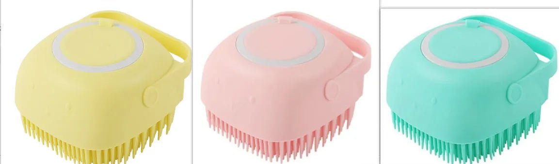 Blue silicone dog bath brush with non-slip handle for washing and massage.