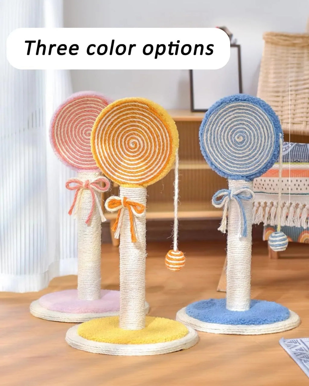 Blue cat scratching post with sisal rope and a hanging ball toy on a sturdy wooden base.