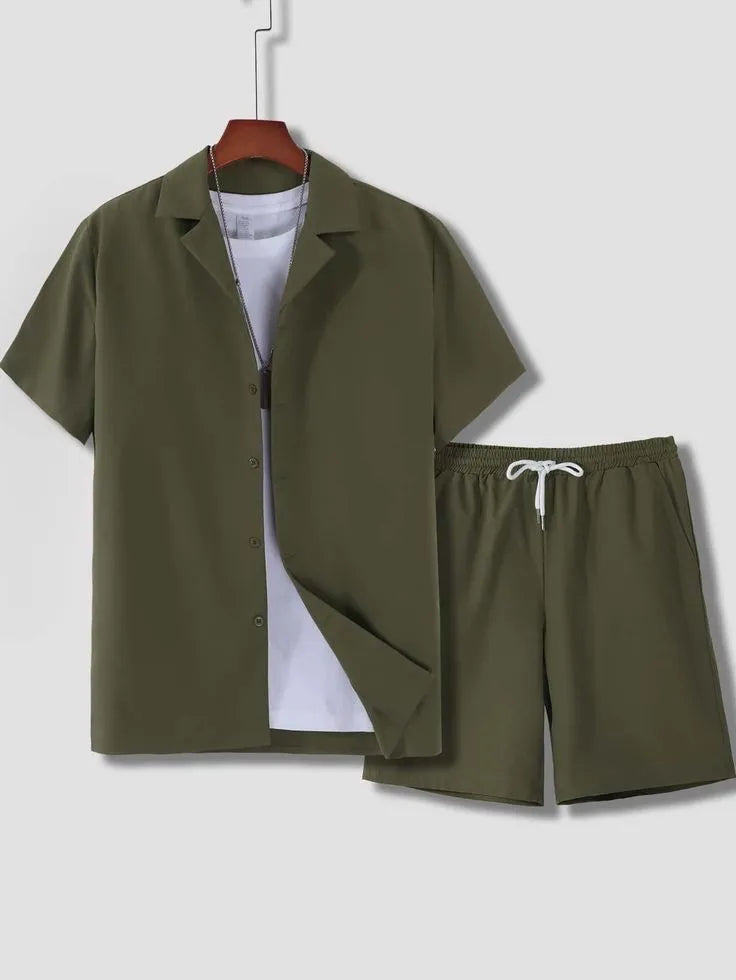 Man wearing a short sleeve white Cuban collar shirt and matching shorts from a lightweight polyester sport suit set.