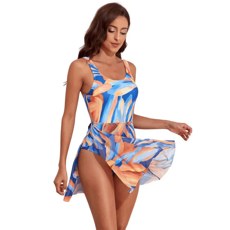 Women's floral one-piece swimsuit with single shoulder strap and slim waist design