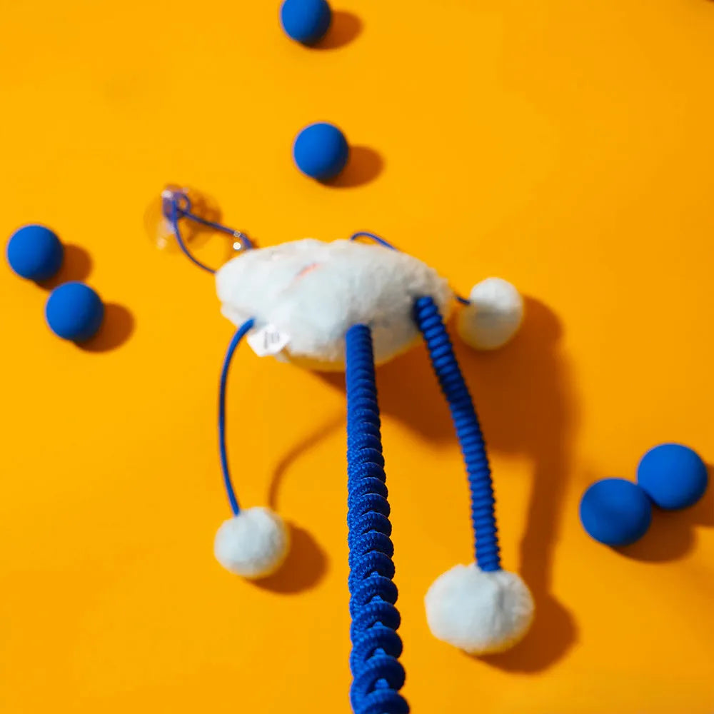 Blue telescopic cat wand toy with plush ring and bell on elastic cord