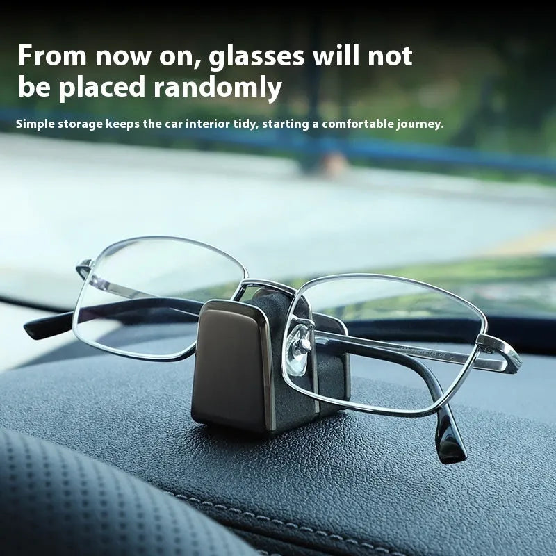 Green zinc alloy and leather car dashboard glasses clip holder with nose pad.