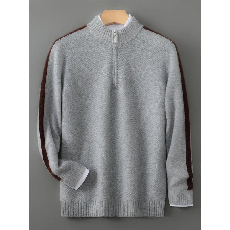 Slim fit grey sheep wool knitted sweater with a half-height zip and round neck on a hanger.