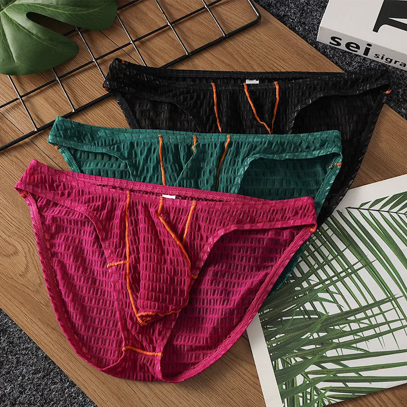 Men's low waist lace briefs in white, black, green, red, and light purple on a size chart.