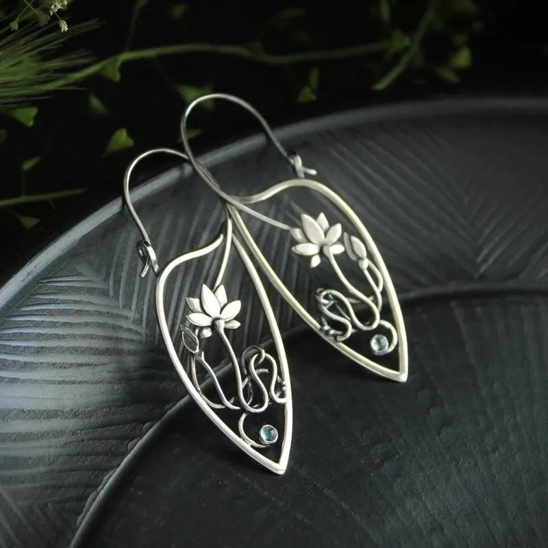 Silver retro style alloy earrings with lotus vine and geometric flower design featuring round rhinestones