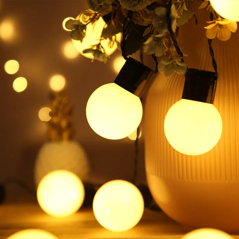 10 metre black wire solar decorative lights with 40 lamps in warm white and transparent ball colour options