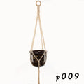 Woven wire cotton rope rustic hanging basket plant holder on a wall.